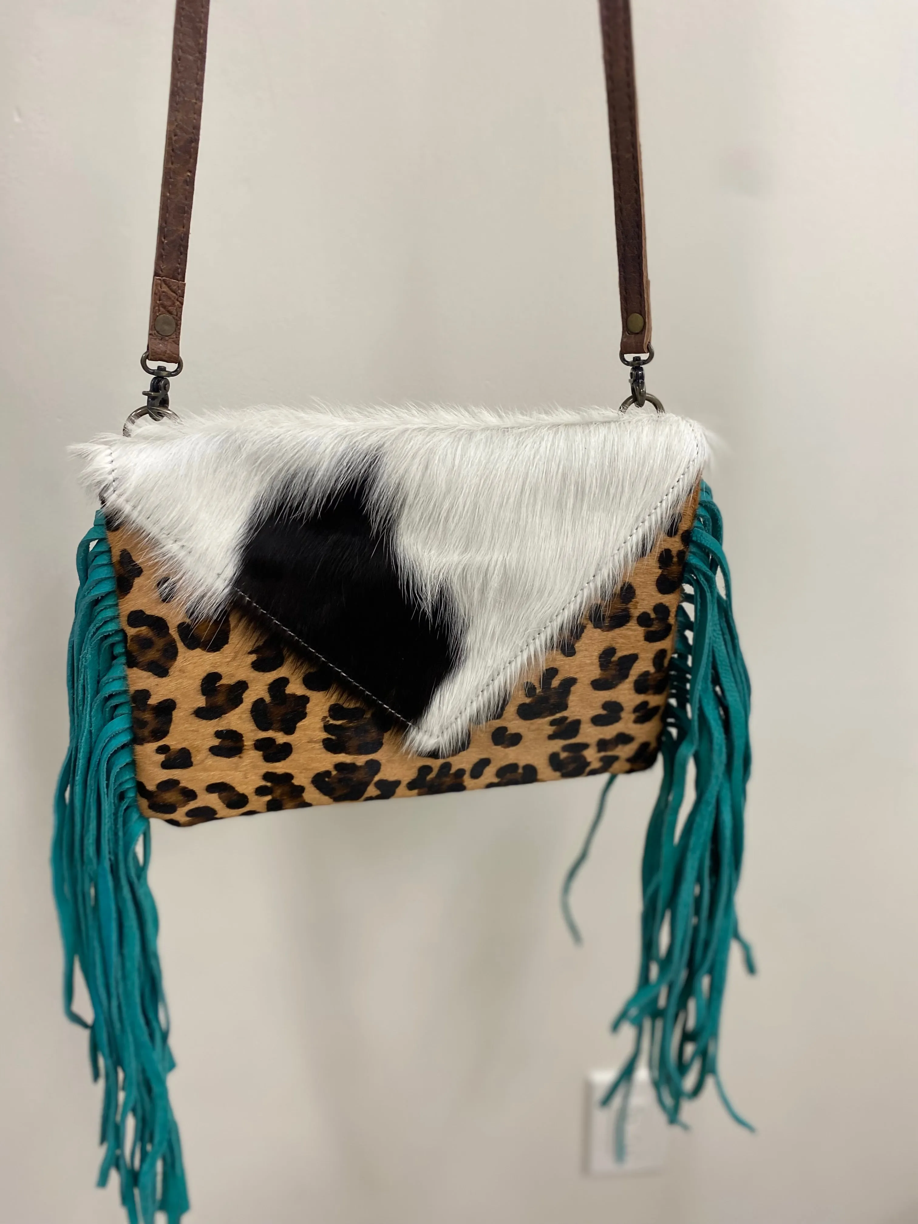 Cheetah crossbody with tourquoise fringes