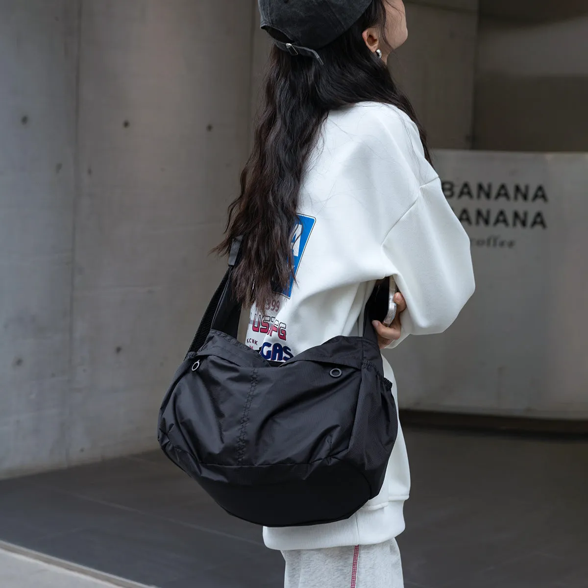 High-grade Nylon Dumpling Unisex Simple Style Crossbody Bags