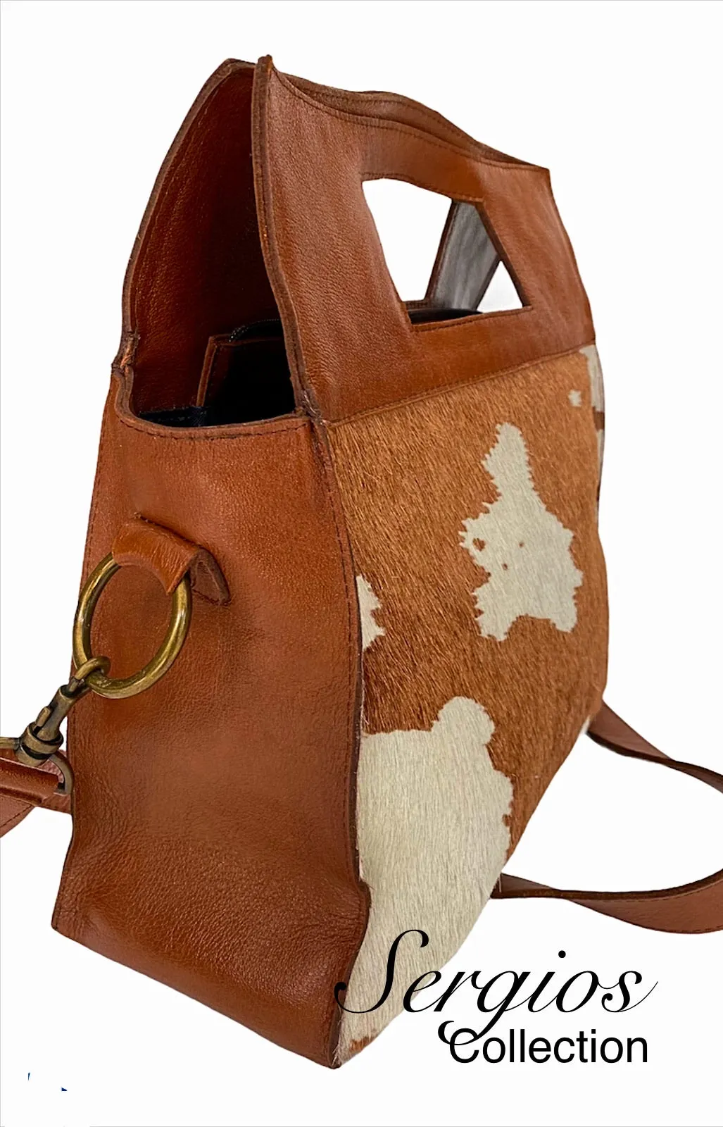 Large cowhide bucket style crossbody.
