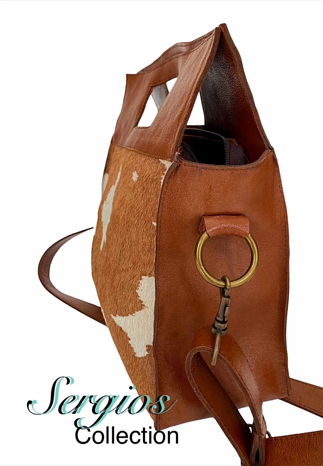 Large cowhide bucket style crossbody.
