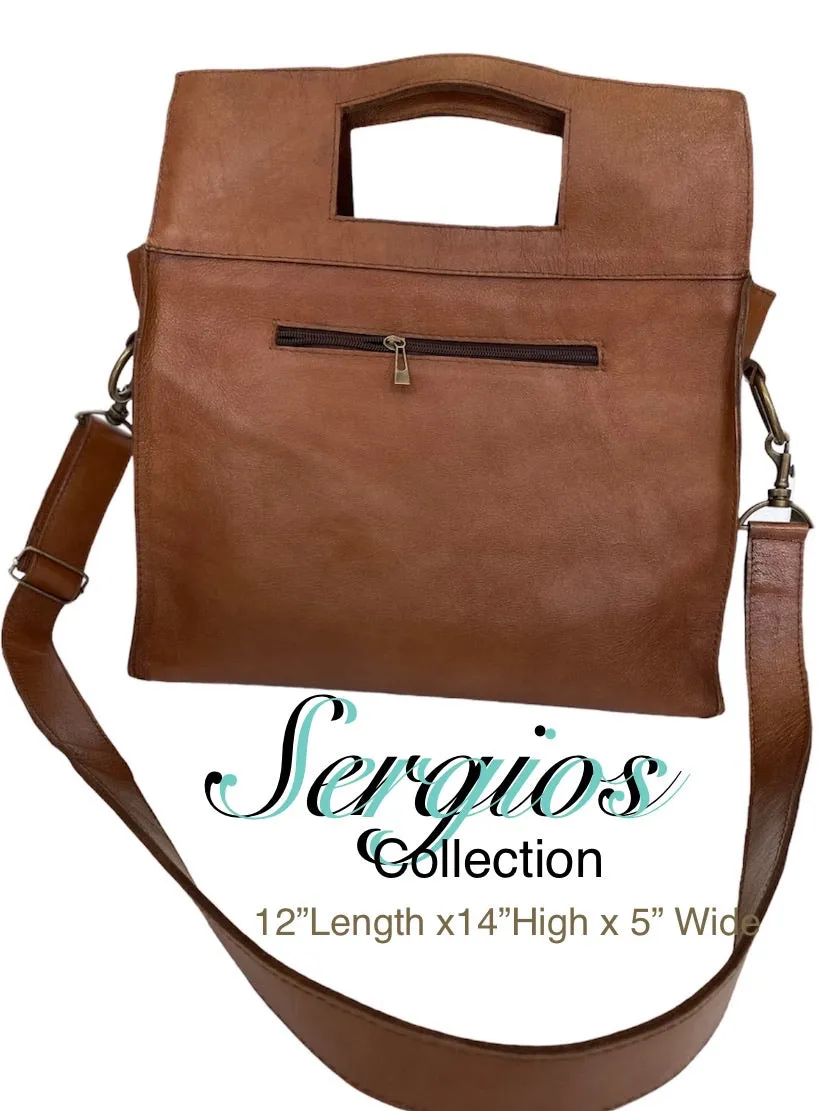 Large cowhide bucket style crossbody.