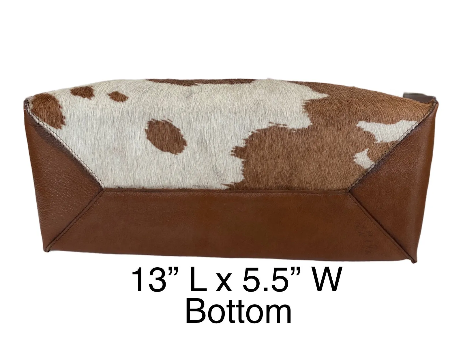 Large cowhide bucket style crossbody.