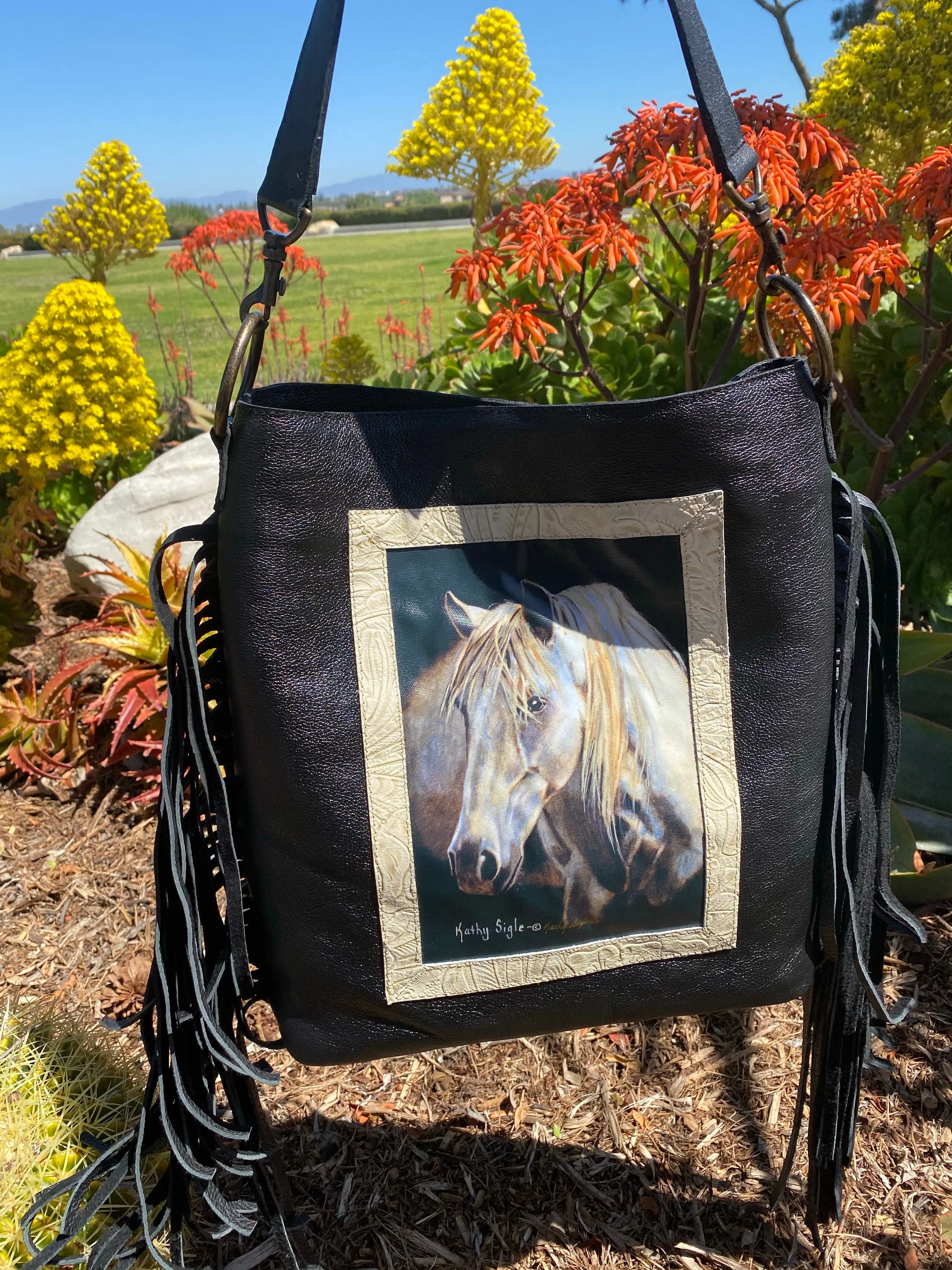 Sergios Collection featuring renowned artist Kathy Sigle limited edition