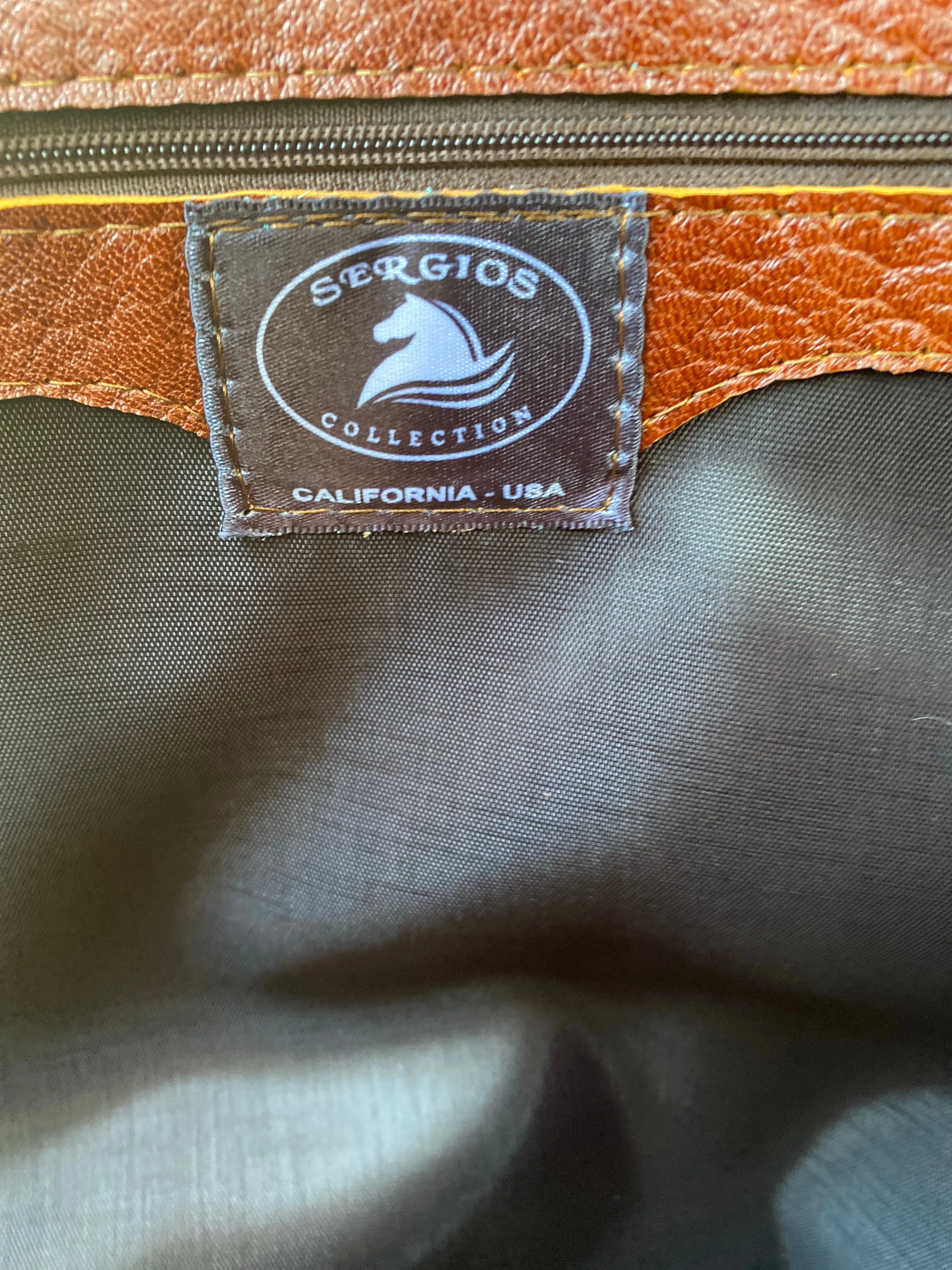 Tote made with genuine leather and cowhide hair on .