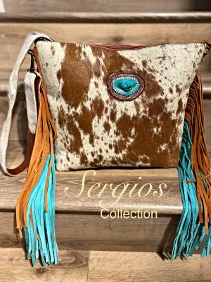 Tote made with genuine leather and cowhide hair on .