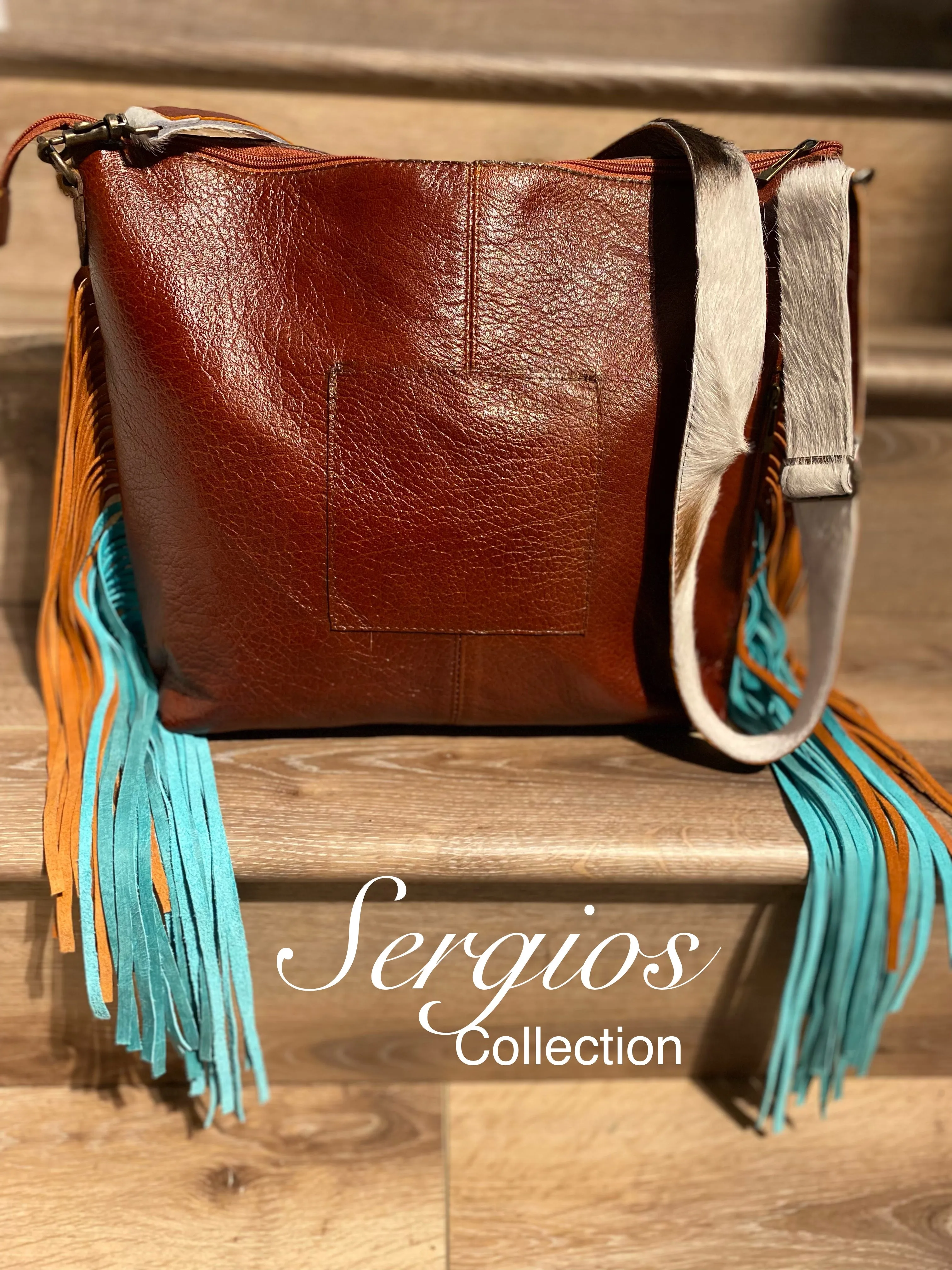 Tote made with genuine leather and cowhide hair on .