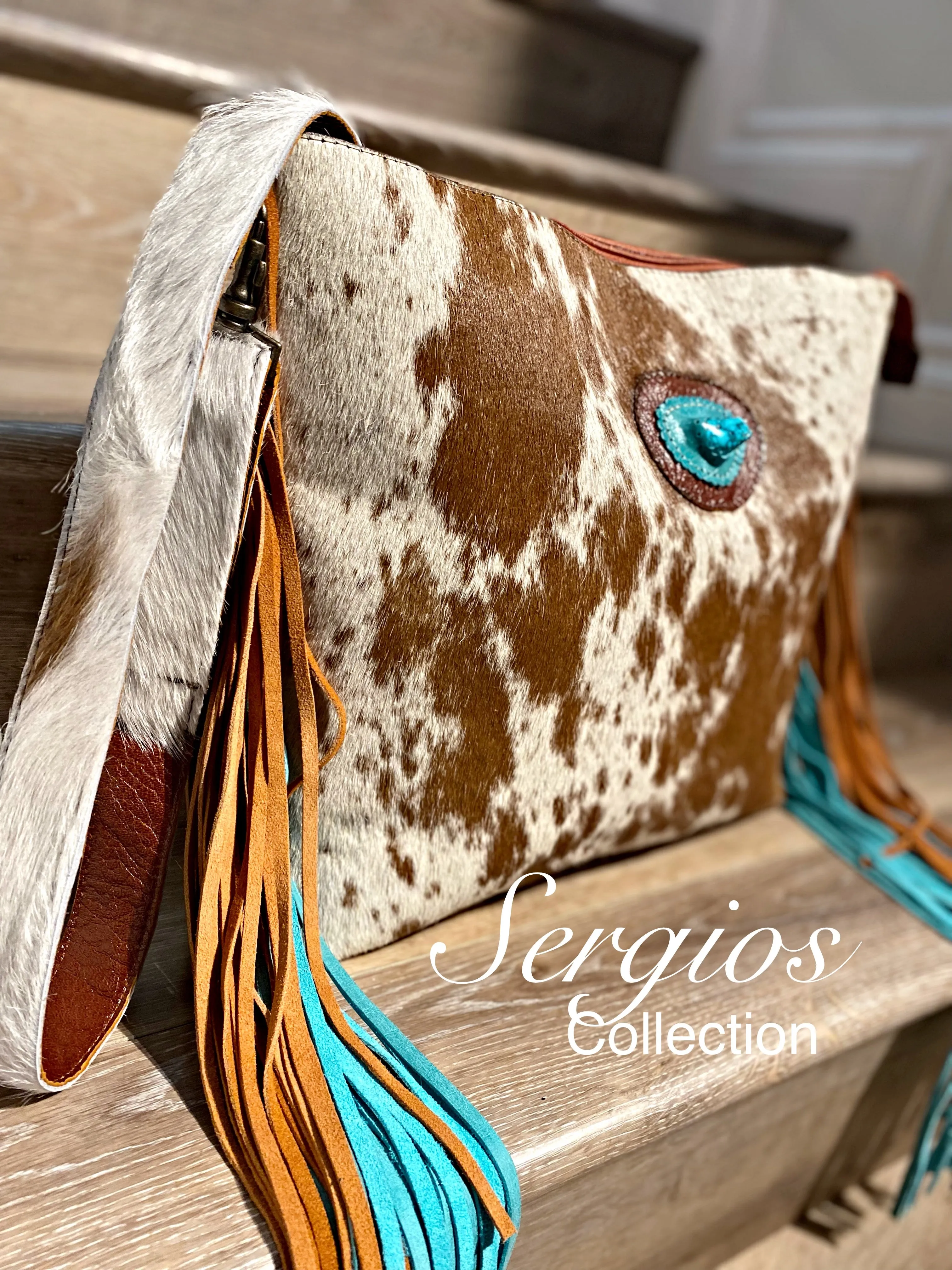 Tote made with genuine leather and cowhide hair on .